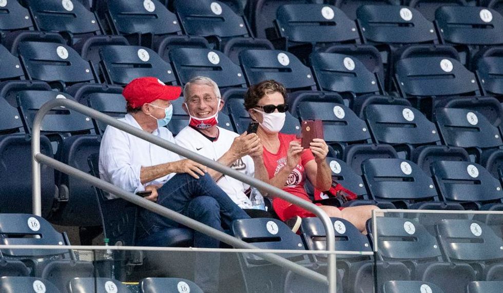 Dr. Anthony Fauci says photo of him without a mask at baseball game is 'mischievous'
