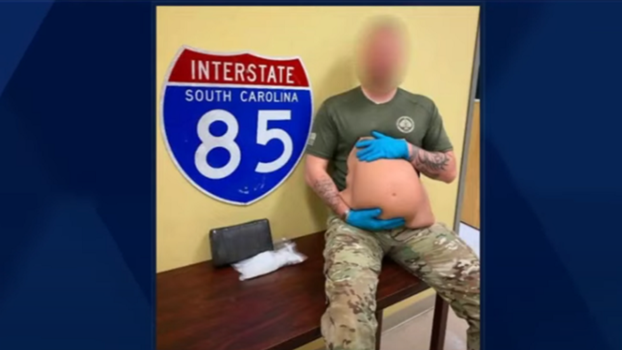 Fake pregnancy belly spills cocaine as woman attempts to sprint from police during traffic stop
