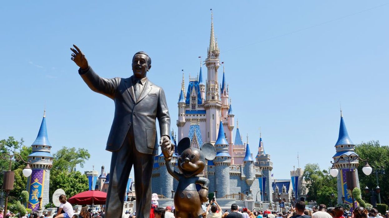 Family 'sick' after apparently discovering transvestite doing little girl's hair and makeup at Disney boutique