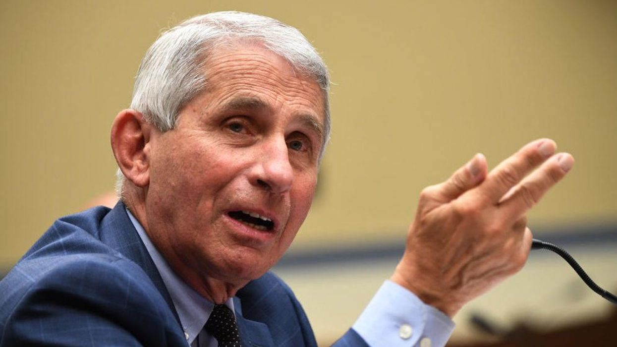 Fauci hits back at critics accusing him of flip-flopping on masks. But he gave a completely different excuse last year.