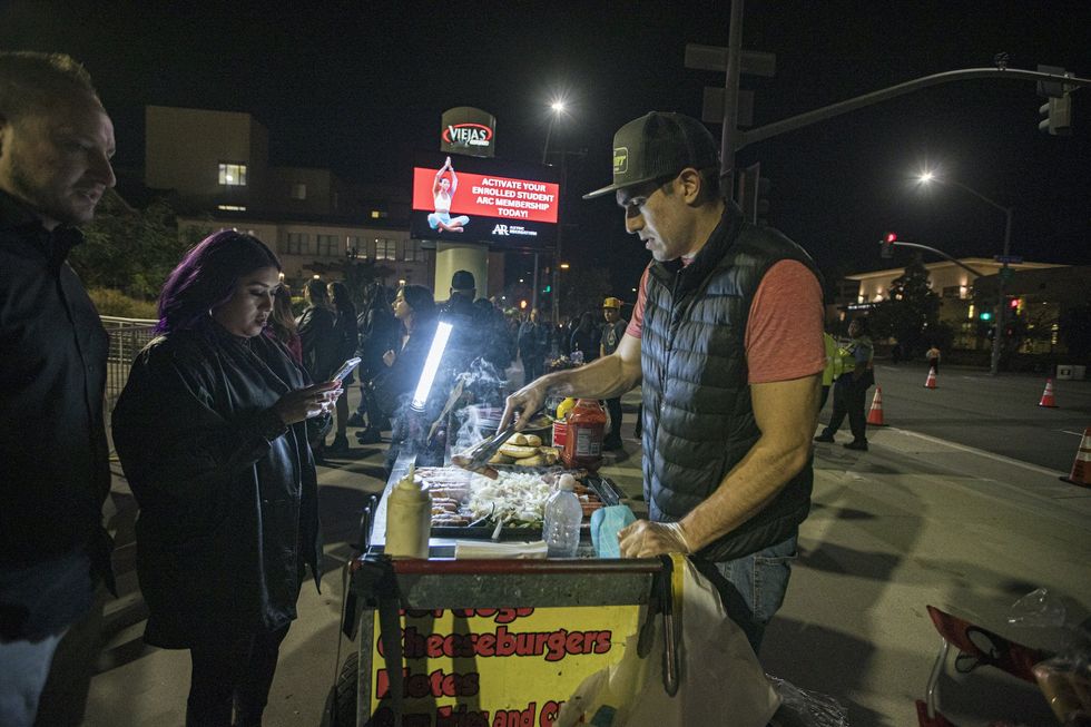 Fed-up restaurant worker flips street vendor's food cart; businesses sue San Diego over vendors, some run by illegal aliens