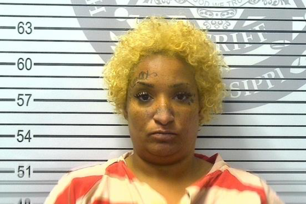 Female accused of inserting razor blades into grocery items; hit with $100K bond