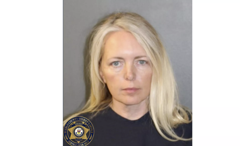 Female arrested after her dementia-stricken mother, 76, was mauled to death in home with 54 dogs