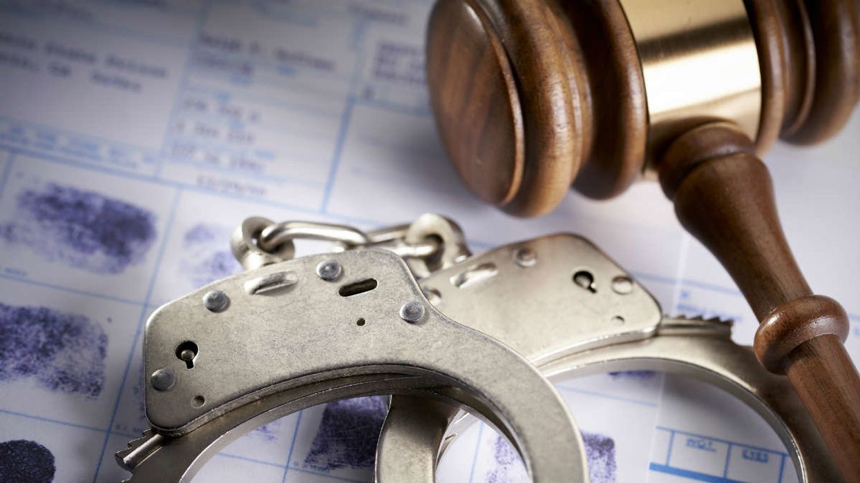 Fingerprints, handcuffs, gavel