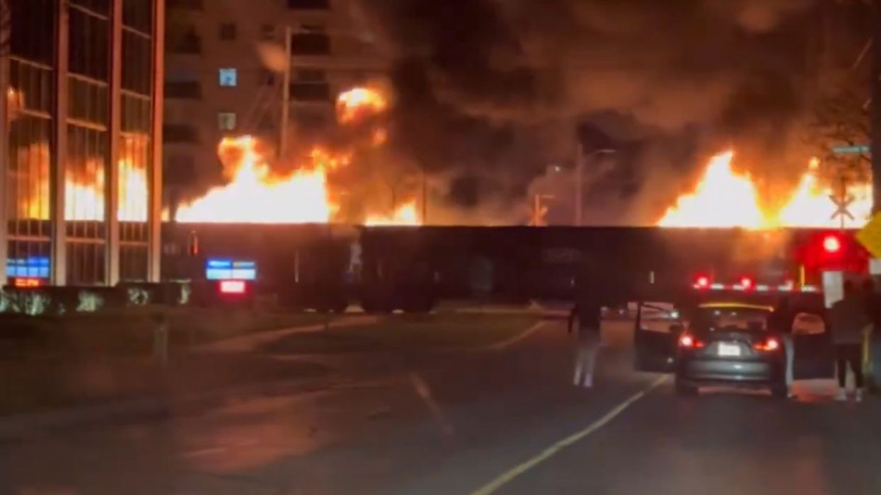 Flaming train caught on video barreling through Canadian city's downtown