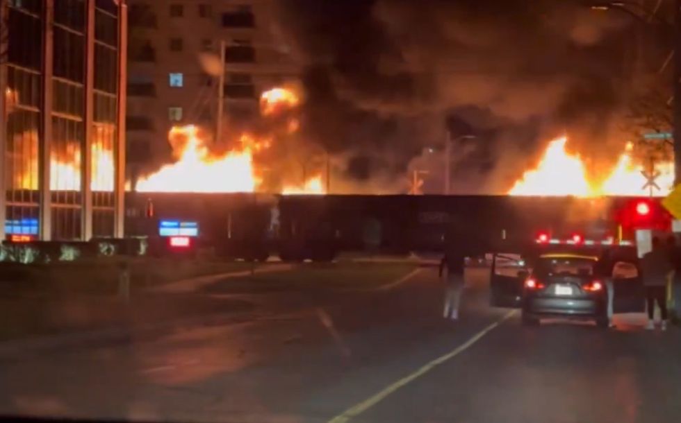 Flaming train caught on video barreling through Canadian city&apos;s downtown