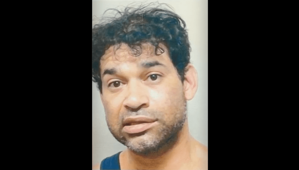 Florida motorist, 41, who cops say sideswiped ambulance, injured paramedic, found asleep on couch when deputies confront him