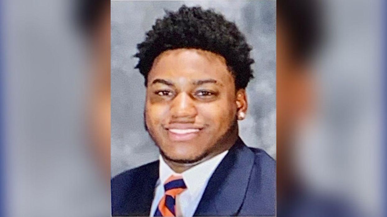 Former University of Virginia football player suspected of fatally shooting 3 school football players, wounding two other students; suspect in custody after all-night manhunt