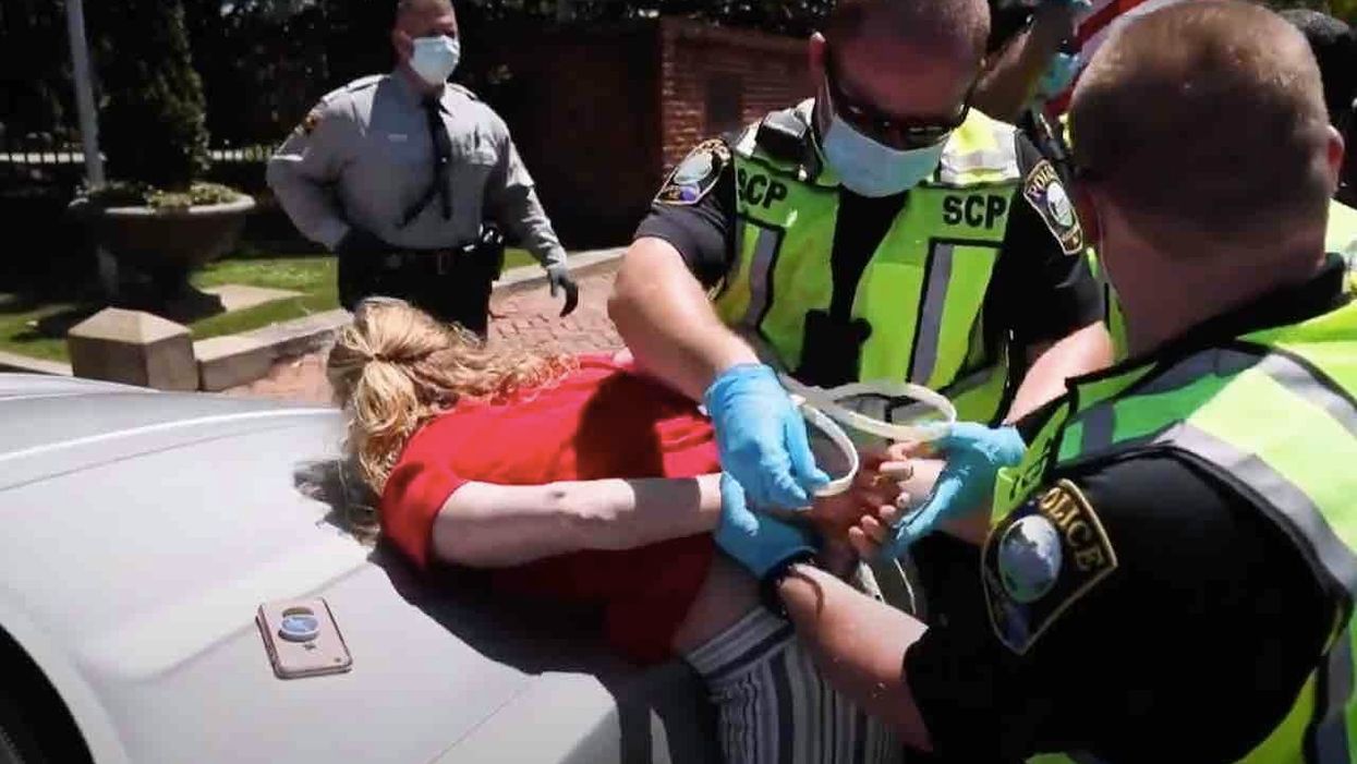 Four lockdown protesters arrested during rally in front of North Carolina governor's mansion