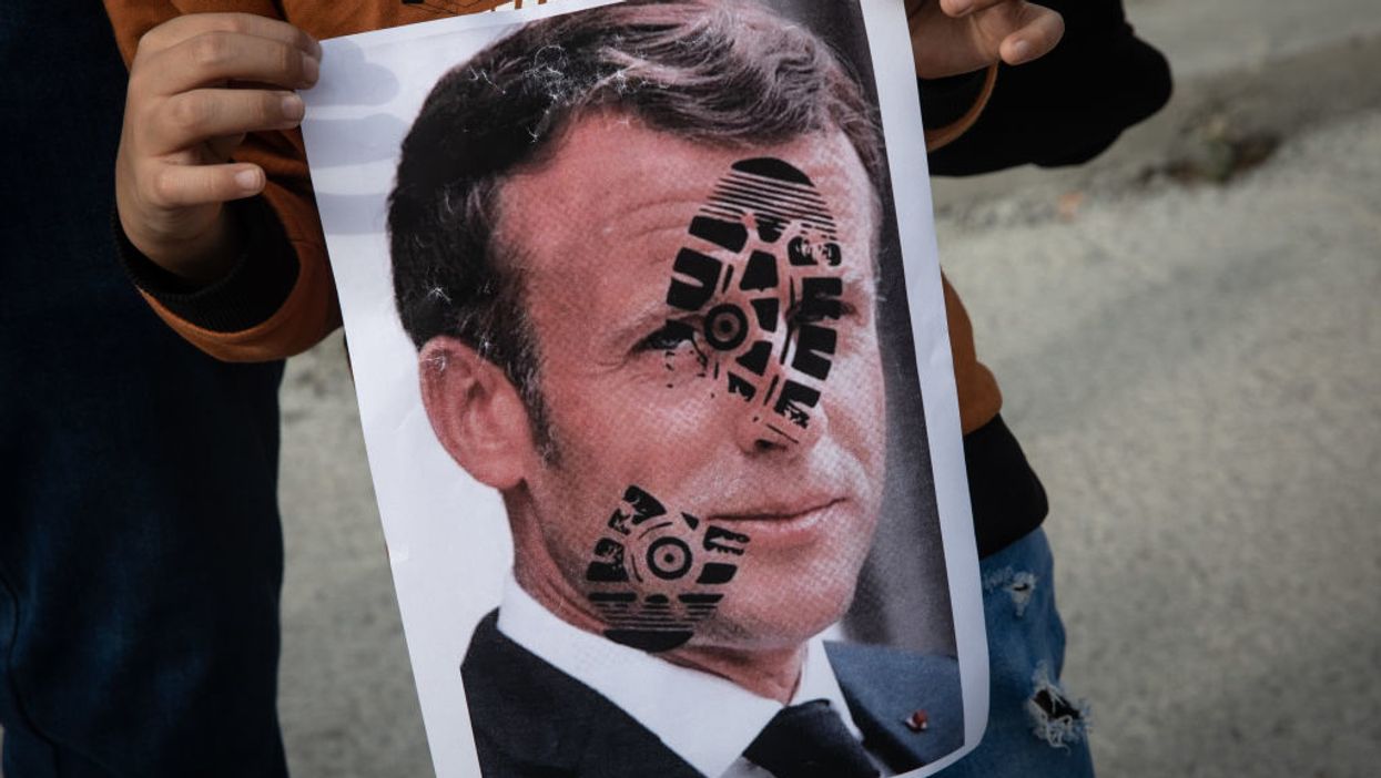 French citizens in majority-Muslim countries warned to take precautions as Muslim anger boils over display of Mohammad cartoons