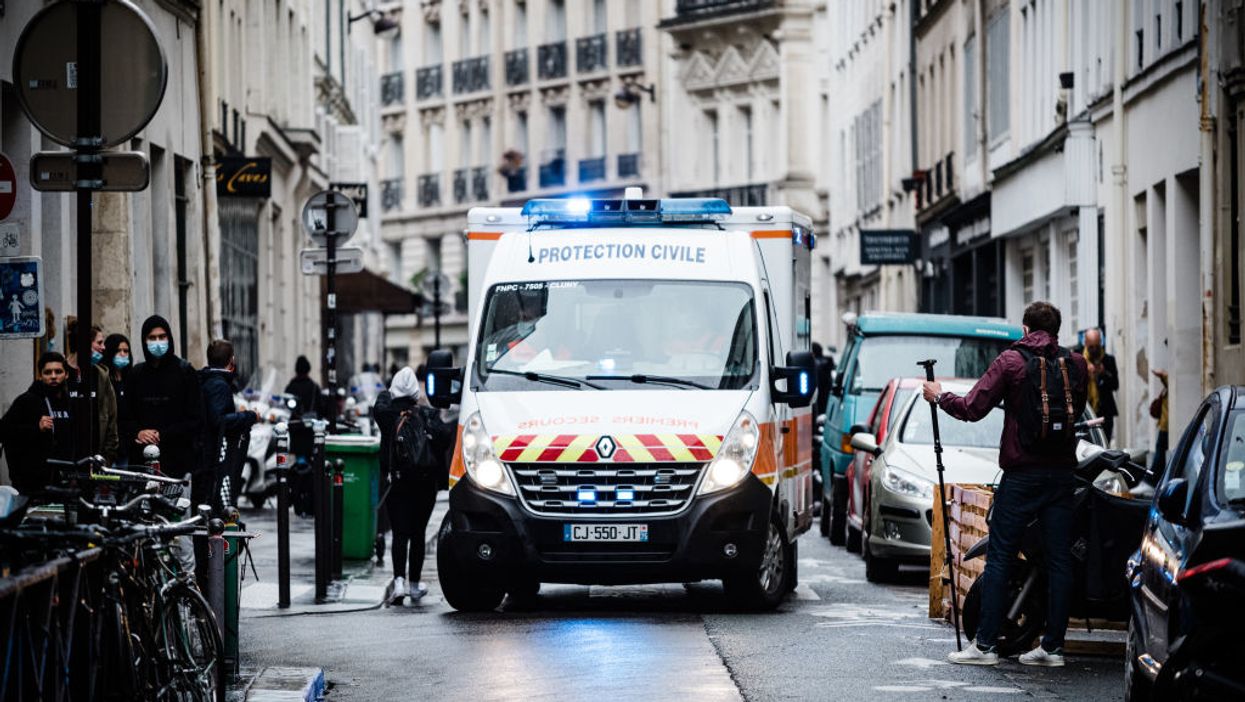 French police launch terror investigation after knife attack near Charlie Hebdo's former office