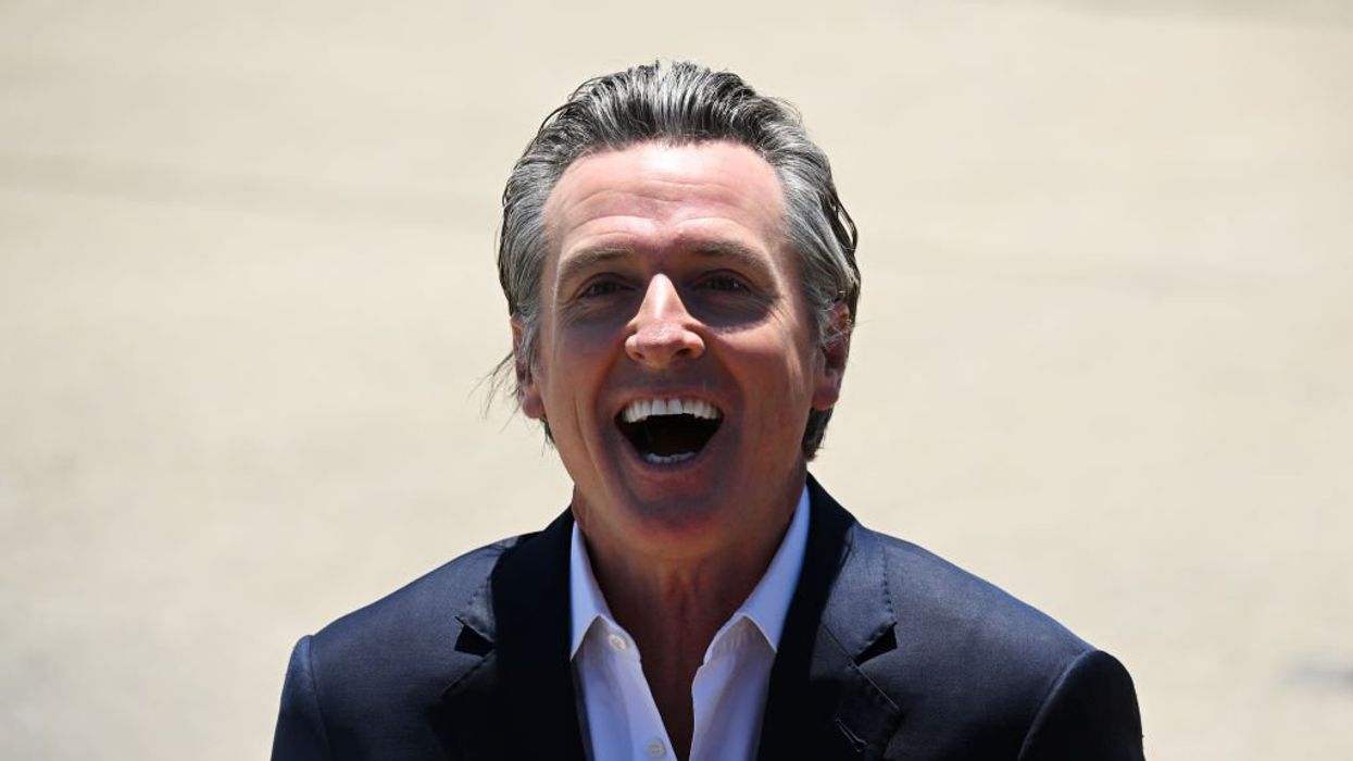 Gavin Newsom chuckles as he signs bills restricting AI use in election ads — but social media users may have last laugh