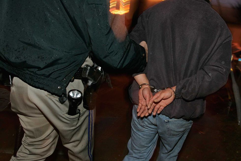 Gay couple arrested on child sex abuse allegations — and they have 5 young sons