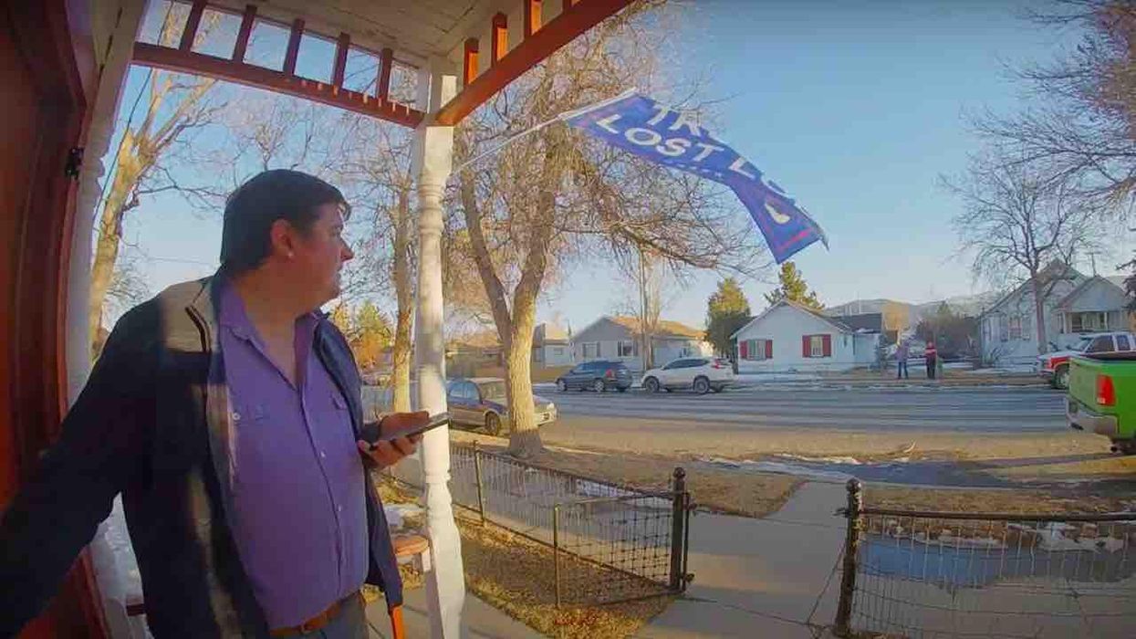 Gay man's 'Trump Lost LOL' flag angers pro-Trump neighbor who's caught on video yelling anti-gay slur at him. Oops.