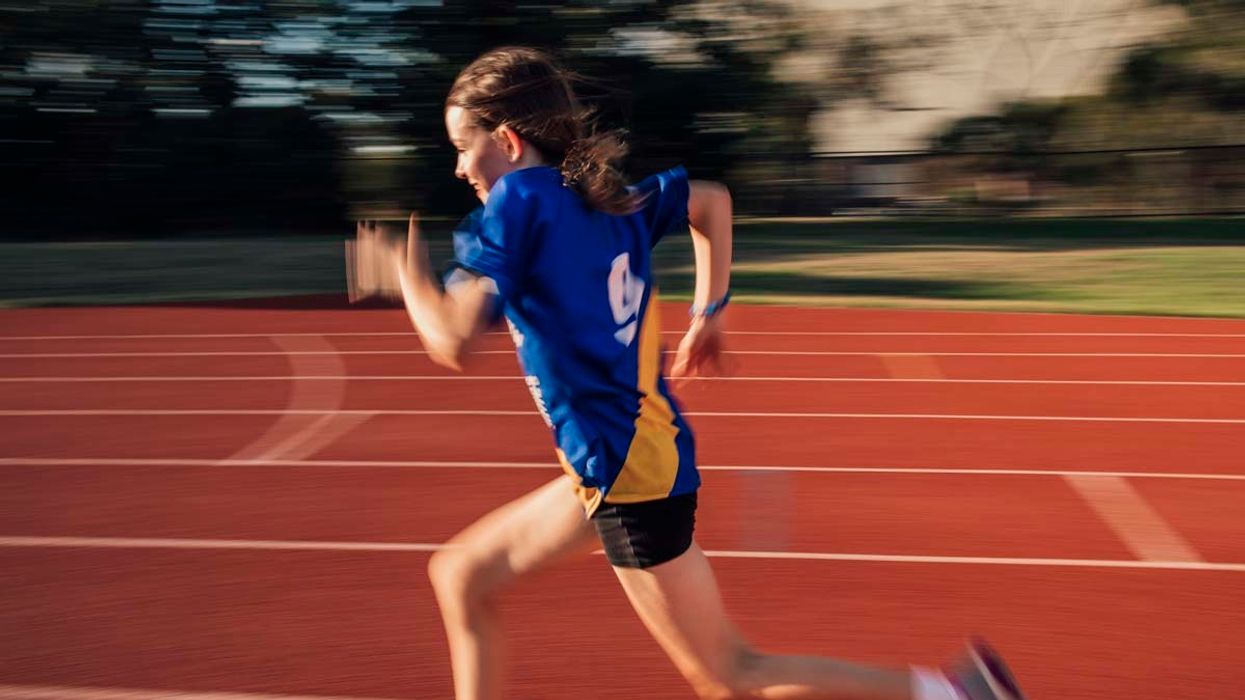 Girl running track