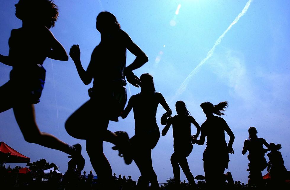 Girls on cross-country team walk off to PROTEST biological male who wants to run with girls