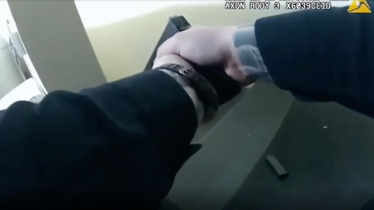 Graphic video captures the moment cops get in Wild West-style shootout with grocery store security guard