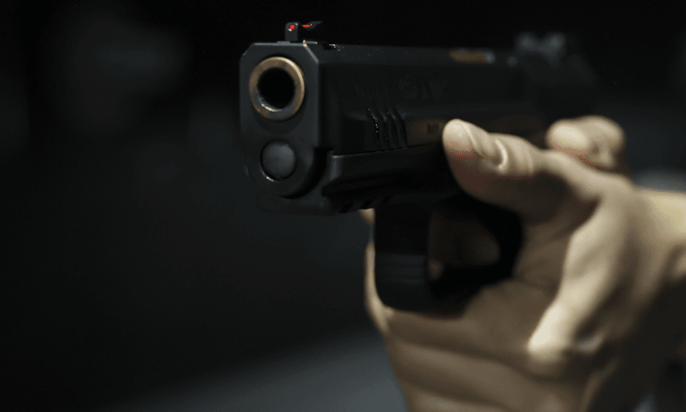 Gun-toting woman 'took care of business' after male broke into her home, entered her bedroom, and wouldn't leave