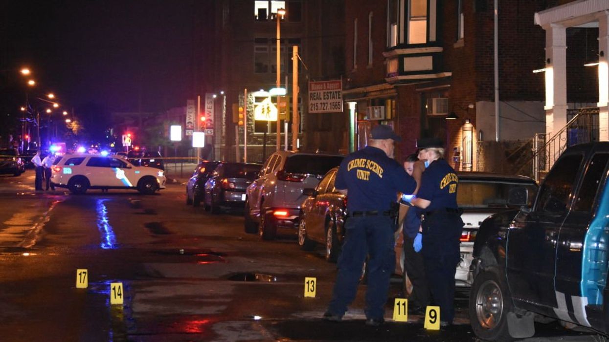Gunman in ballistic vest kills 5 adults, injures 2 children in Philadelphia mass shooting, police say