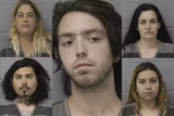 Half-naked woman 'missing flesh' and handcuffed in backyard was tortured for weeks, beaten with bat, shot with BB gun: Cops