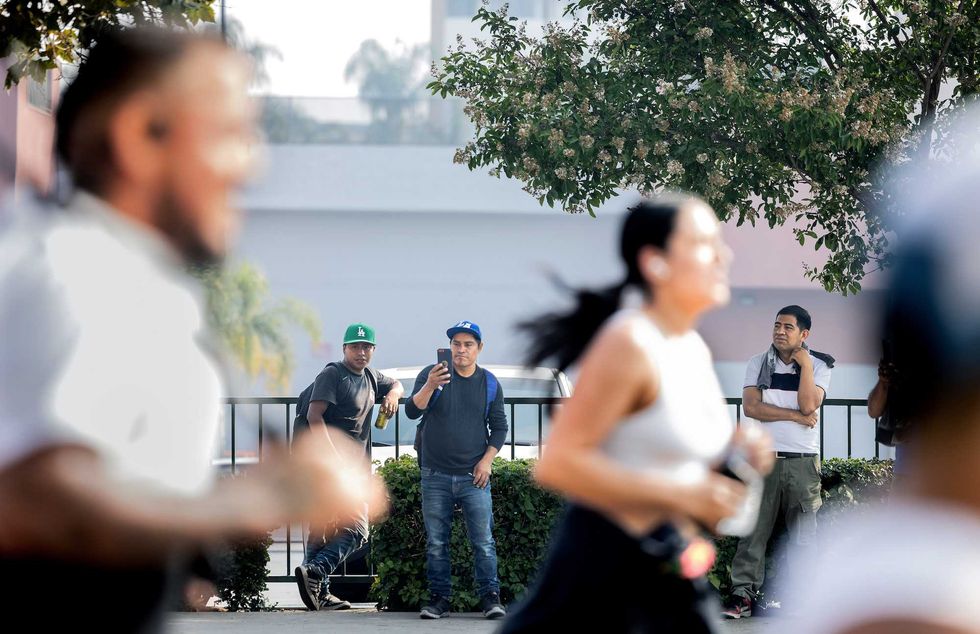 'Have some respect for Africa town': Blacks threaten Latino running club over 'hostile takeover' of black neighborhood