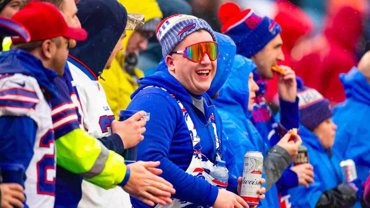 He stereotypes QB's fans as 'people with American flags and dogs.' Then EPSN host gets put on blast by Buffalo Bills' players.