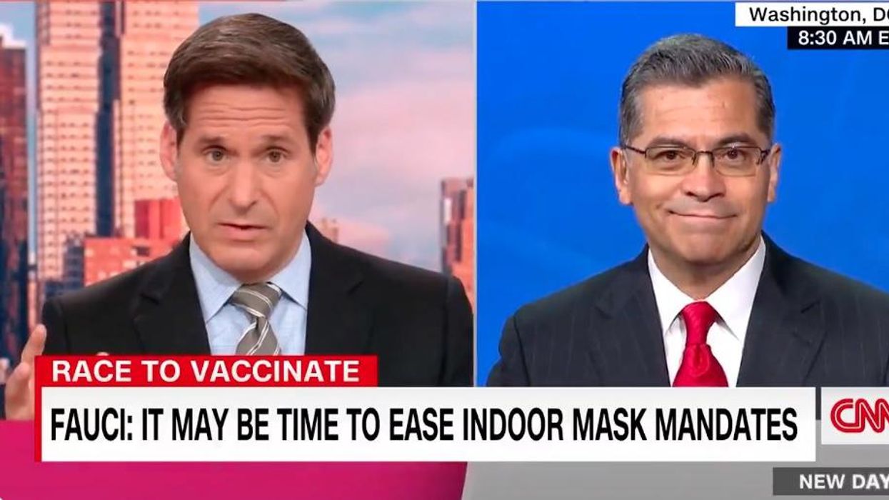 Health Sec. Becerra wants vaccinated people to keep wearing masks — but has trouble explaining why
