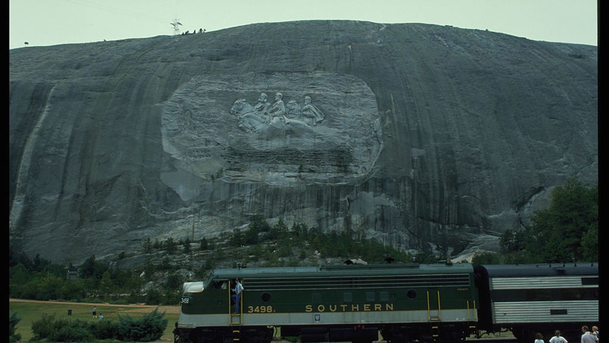 Heavily armed militia marches on Stone Mountain State Park in Georgia to protest Confederate monument