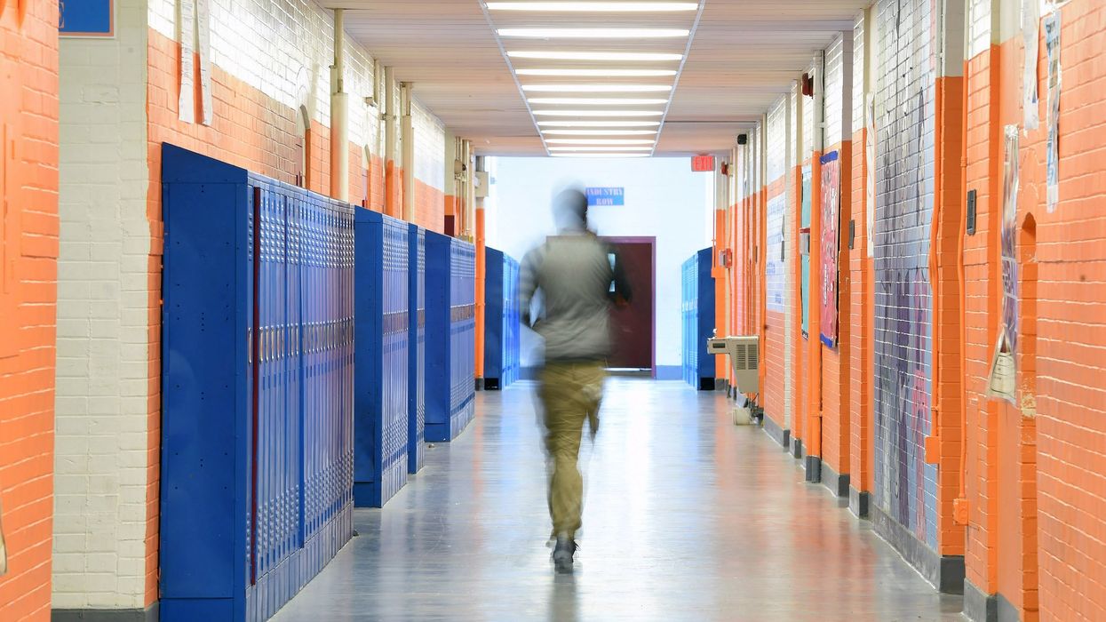 High school teacher's license suspended over inappropriate notes in students' yearbooks and devil costume in class