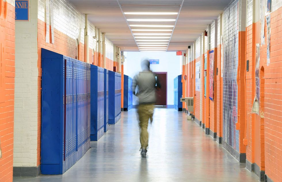 High school teacher's license suspended over inappropriate notes in students' yearbooks and devil costume in class