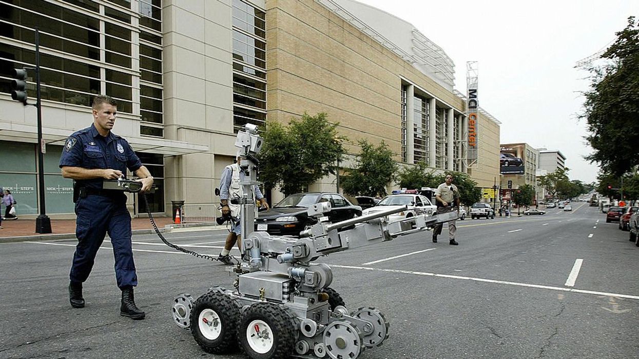 High-tech hero: Video shows police bomb squad robot outsmart, pin down hotel gunman in Texas showdown