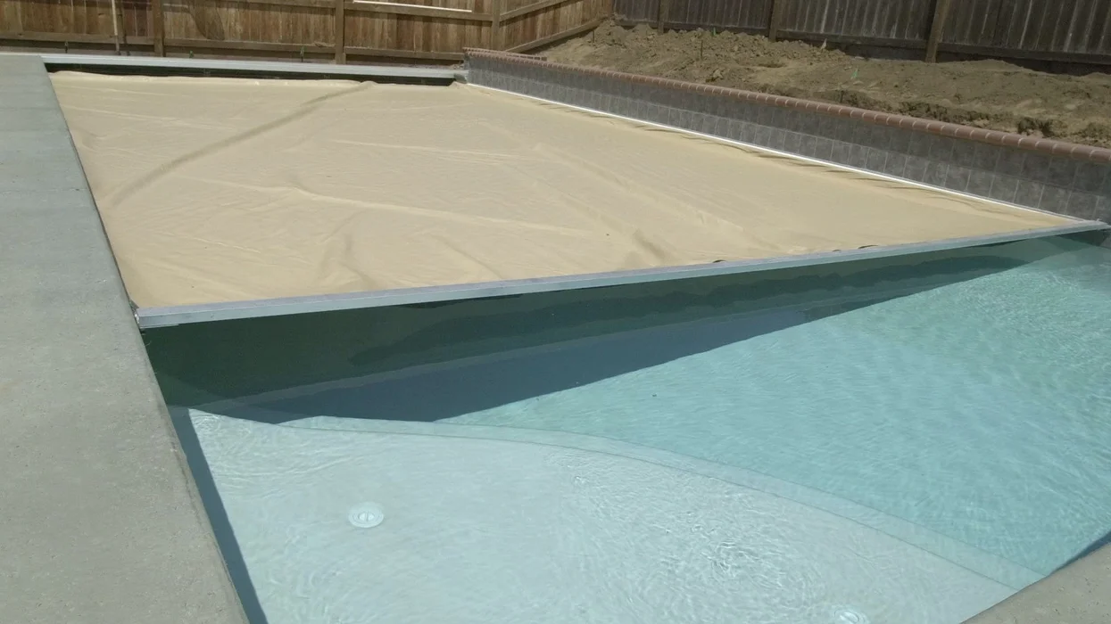 Homeowner uncovers pool for the summer and makes disturbingly gruesome find