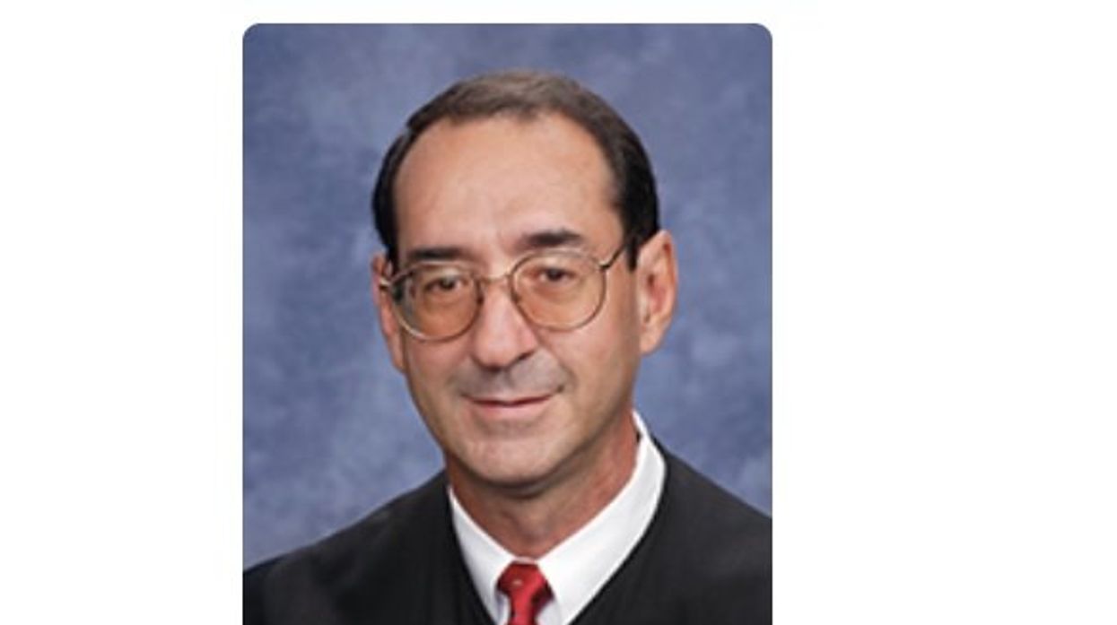 Judge had teen girl placed in handcuffs in open court to scare her out of following her father's 'path' of drug abuse: Report