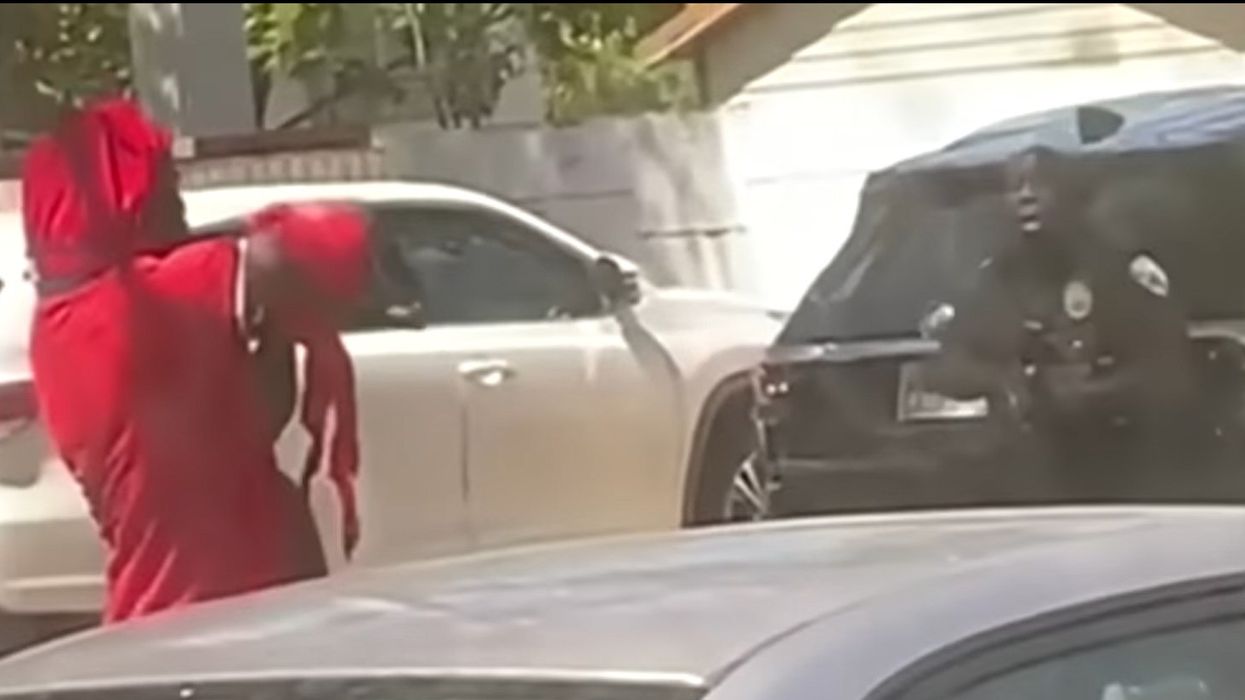 Hostage saved after police blow away machete-wielding suspect