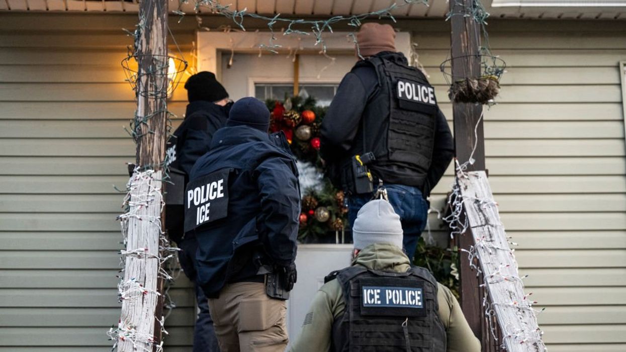 'Hostile' mob swarms ICE agents making arrest in blue state — then female with baby blocks federal vehicle
