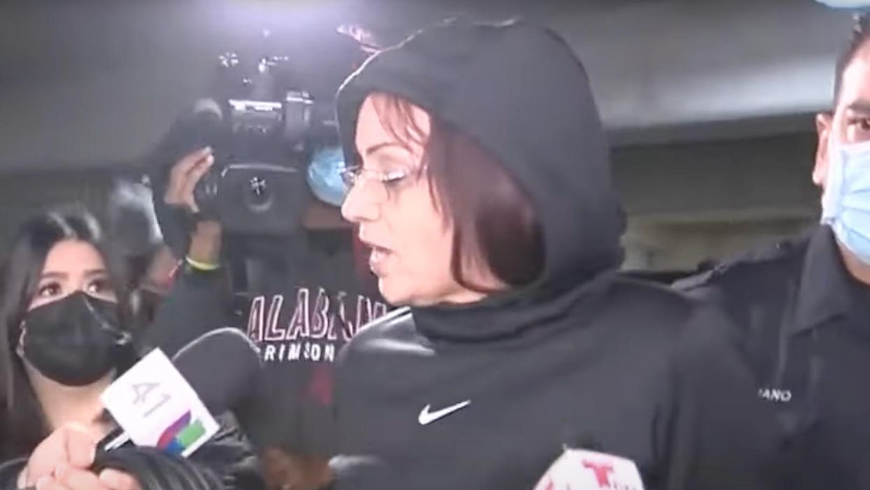 House of horrors: Police arrest woman after finding injured and 'heavily soiled' toddlers hogtied, trapped inside home