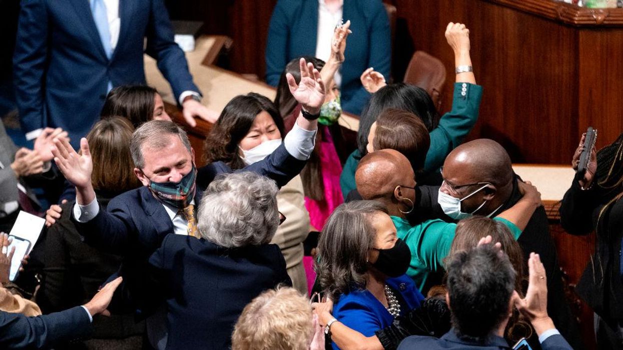 House passes Biden’s $1.75 trillion social and climate spending plan. CNN warns it's 'too soon' for Dems to celebrate as showdown looms in Senate.