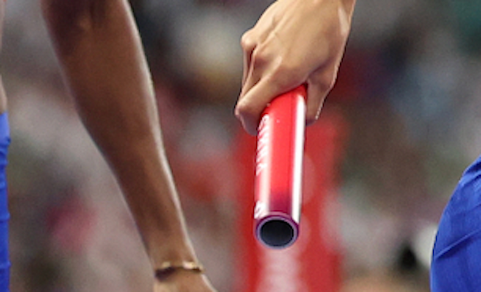 HS runner who struck opponent in head with baton charged with assault and battery
