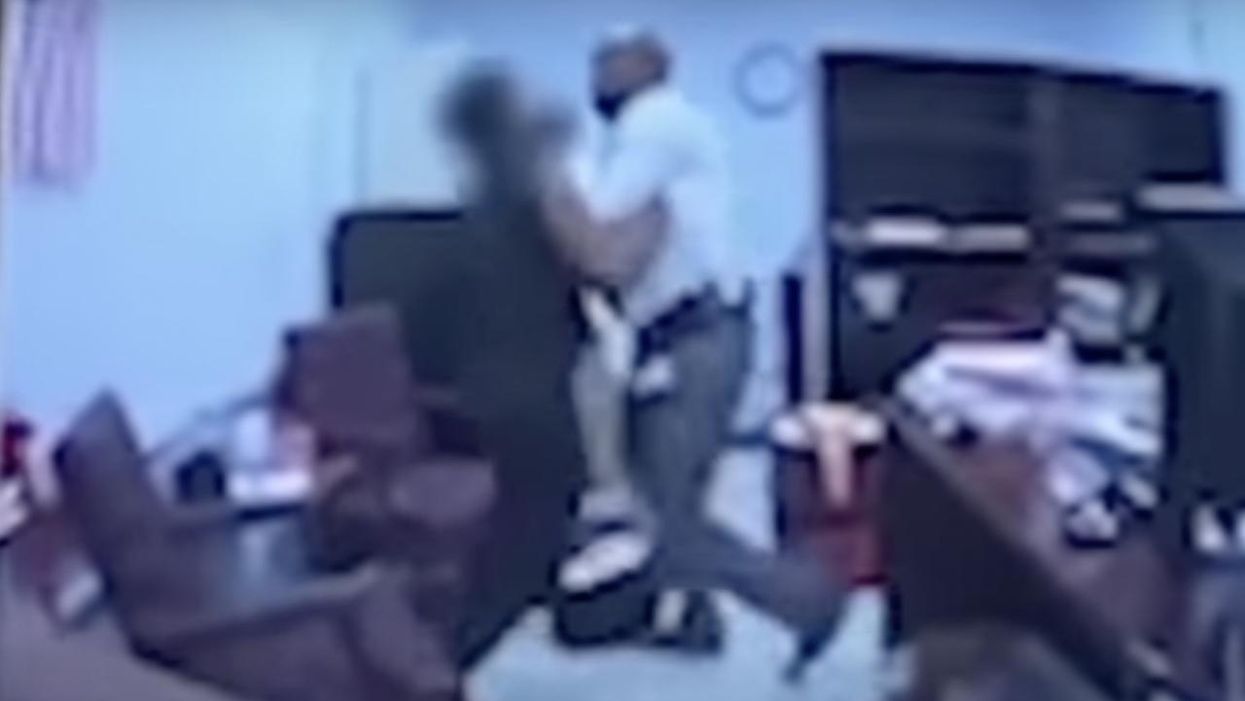 HS staffer punished for grabbing female student who attacked him. Student was suspected of possessing gun — and one was found in her book bag after dust-up.