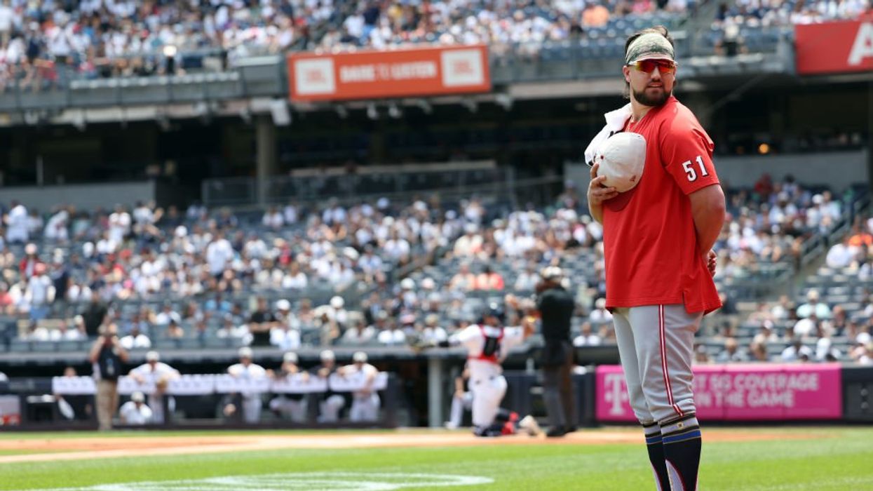 'I'm not moving': Yankees and Reds have epic 4th of July national anthem standoff — umpire laughs at stone-faced players