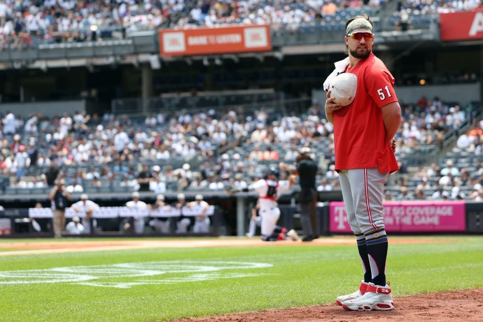 'I'm not moving': Yankees and Reds have epic 4th of July national anthem standoff — umpire laughs at stone-faced players