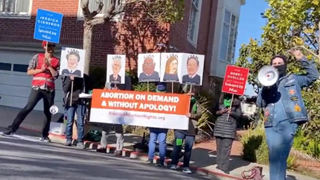 Pro-abortion activists are protesting outside Nancy Pelosi's house accusing her of being 'complicit' in destroying abortion rights
