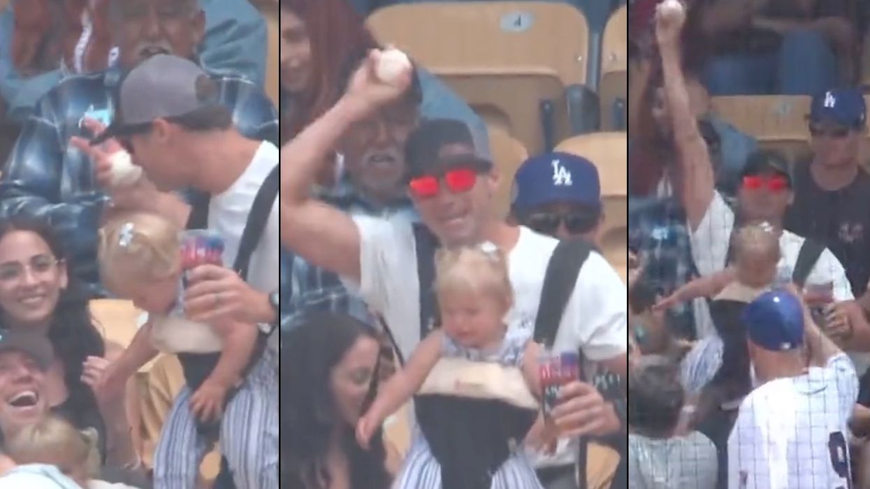 Viral video shows Dodgers fan catch a foul ball with his bare hand while carrying a baby — without spilling his beer