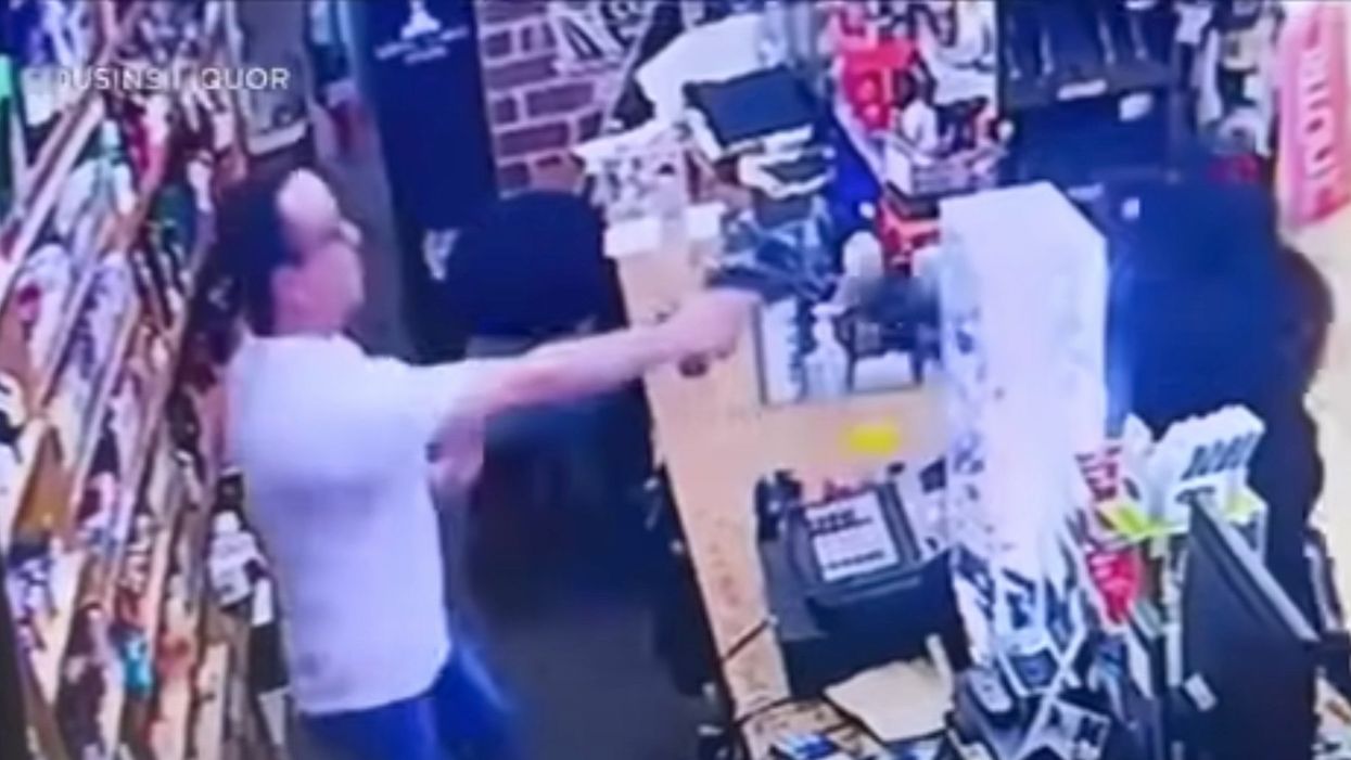 VIDEO: Thug threatens to shoot liquor store owner and runs off when he pulls out his own gun