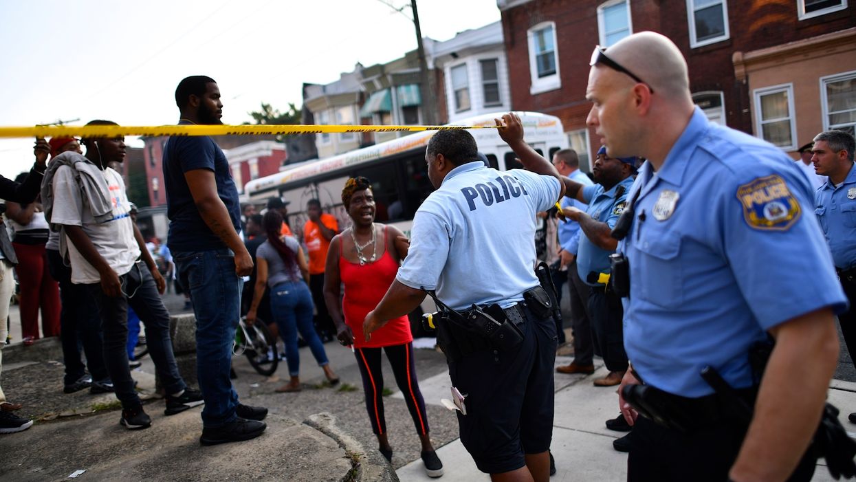 Bystanders taunted and laughed as police officers were being fired upon in Philadelphia