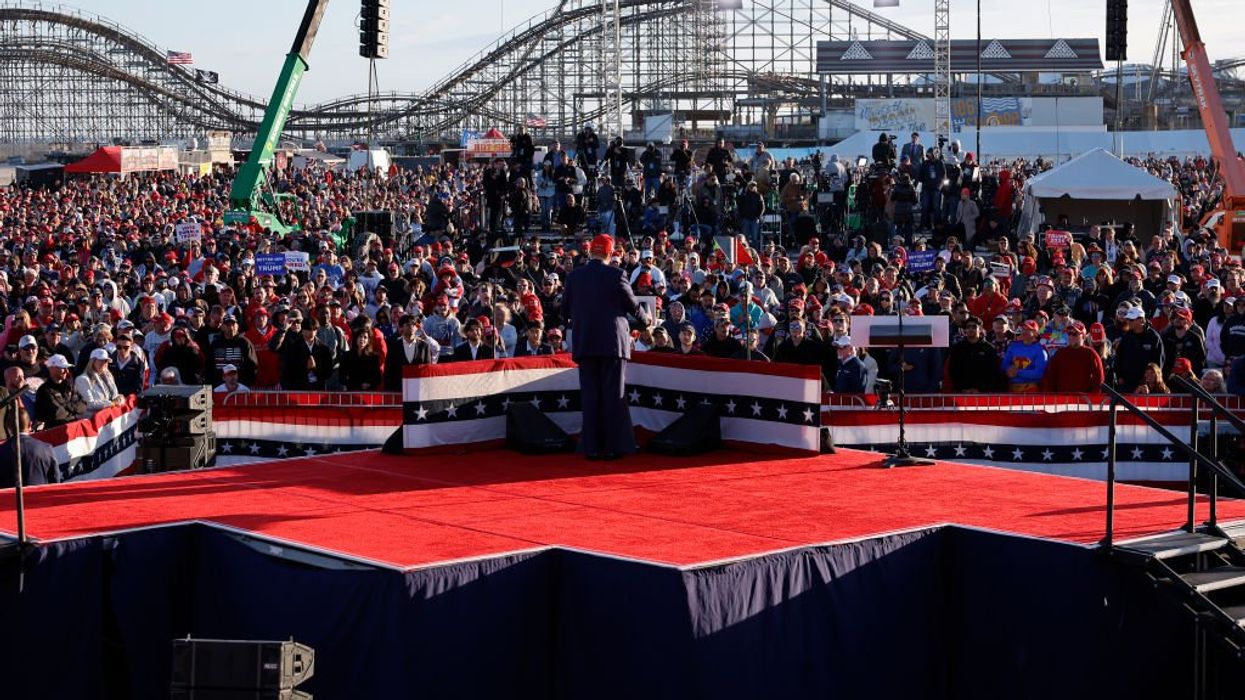 Trump says 'gloves are off' in handling 'moron' Biden at huge rally in deep-blue New Jersey, vows to fight America's enemies within