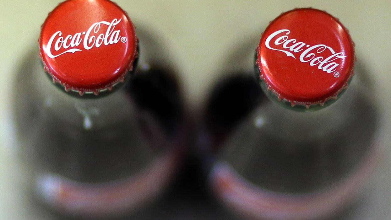 Coca-Cola ad features same-sex couple kissing. Now the company is facing calls for a boycott.