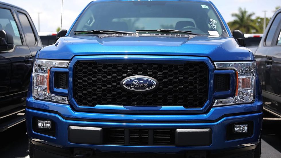 About 2 million Ford pickup trucks recalled after seat belt mechanism sparks fires