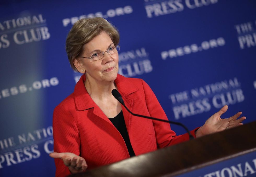 Our country is at risk': Liz Warren uses NYT's op-ed to call for Trump's removal from office