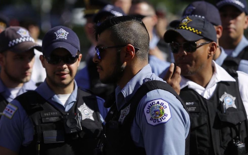 Chicago cops who point their guns must radio dispatchers about their actions starting next July